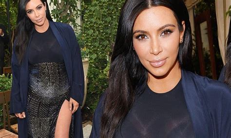 Kim Kardashian Flashes Some Leg In Sparkly Dress At Vogue Fashion Show Daily Mail Online