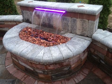 This is important to consider when determining whether to go with unilock vs belgard pavers. Unilock Brick Paver Brussels Tumbled Wall and 16 color led ...