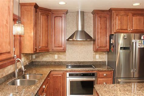 Consider natural stone for your kitchen backsplash. Natural Stone Kitchen Backsplash with Beige Basket weave ...