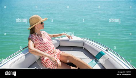 Women Relaxing In Boat On Water Stock Photo Alamy