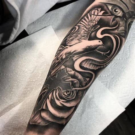 When jesus was baptized by john, according to bible, the holy spirit manifested flying above him like a dove. 75+ Dove Tattoo Designs and Symbolic Meaning - Peace ...