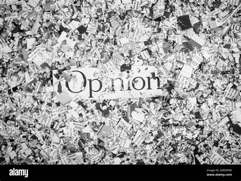 Newspaper Confetti From Above With The Word Opinion Background Stock