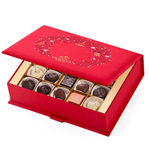 Find the perfect gift or treat yourself. Godiva Swarovski Box & champagne Cadeau - Gift.be