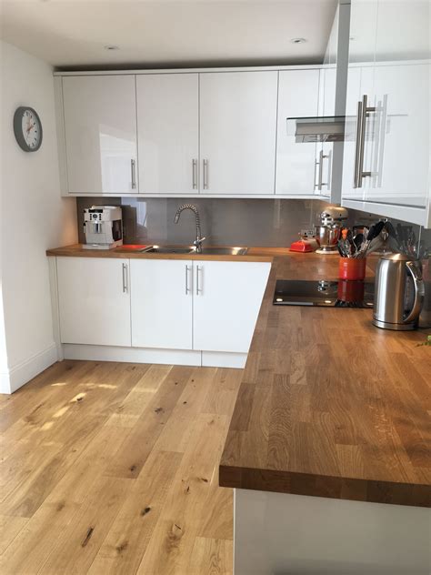 White gloss kitchen with oak worktops White Kitchen Oak Worktop, White