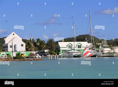 Wind Surfer Sailing In Falmouth Harbour Marina In Antigua Barbuda In