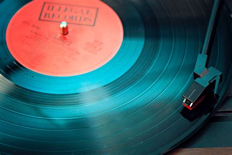 Blue Vinyl Record Playing On Turntable · Free Stock Photo