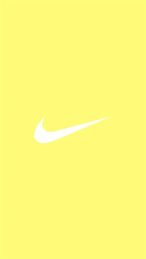 Download Nike Logo On Cute Pastel Yellow Aesthetic Wallpaper