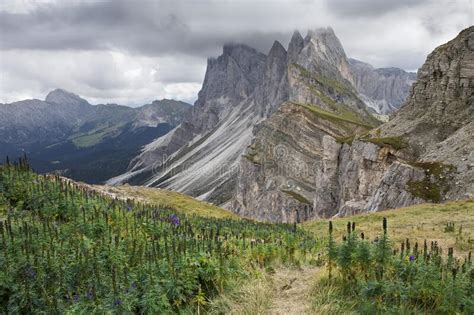 Dramatic Mountain Peaks Of Seceda With Heavy Clouds In The European