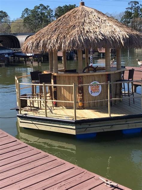 sailing the pristine waters of lake conroe cruisin tikis is your own personal island paradise