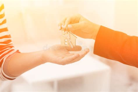 Close Up Shot Of Hands Giving Keys Of An Apartment Stock Photo Image