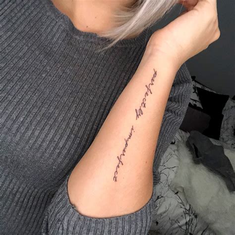 Meaningful Forearm Lettering Tattoos Small