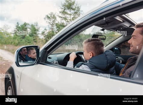 Father And Son In Car Stock Photo Alamy