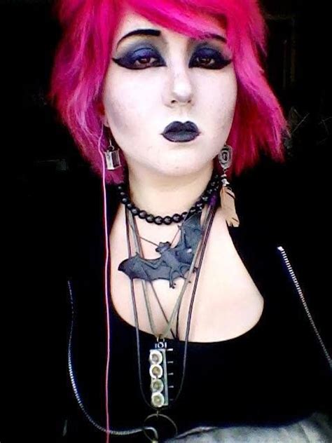This Is A Young Goth Woman With Hot Pink Hair Smokey Gothic Make Up A Casual Gothic Outfit