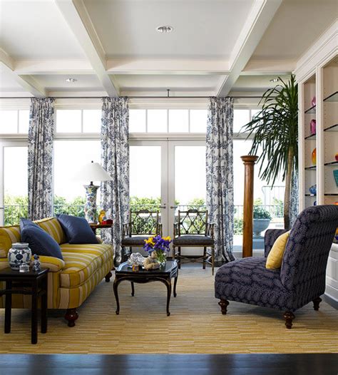 This living room shows us gentle curves as seen on the couch, the coffee tables and the chair mostly contribute to the room's elegant look. Decorating Ideas for a Yellow Living Room