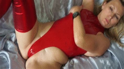 showing all in red slinkystylez rubber swimsuit and wetlokk stockings fetishalina shiny latex