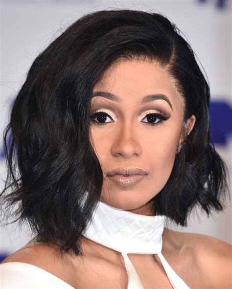 The cardi b hairstyles for consistently is a polish of twists, a reasonable geometry of the lines and simple carelessness, giving the picture of a lively coquetry. Cardi B Asymmetrical Cut - Cardi B Looks - StyleBistro