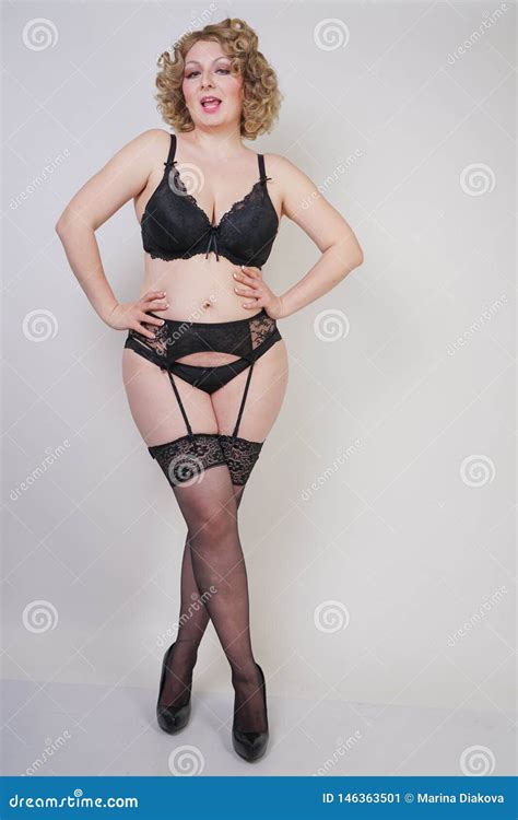 Pretty Caucasian Chubby Woman With Plus Size Body And Pale Skin Wearing Black Underwear With