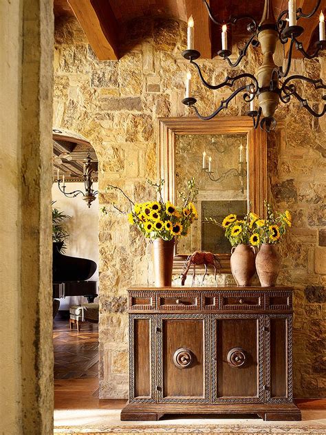 Stone Walls And Custom Decor Give The Entry A Tuscan Flavor Decoist