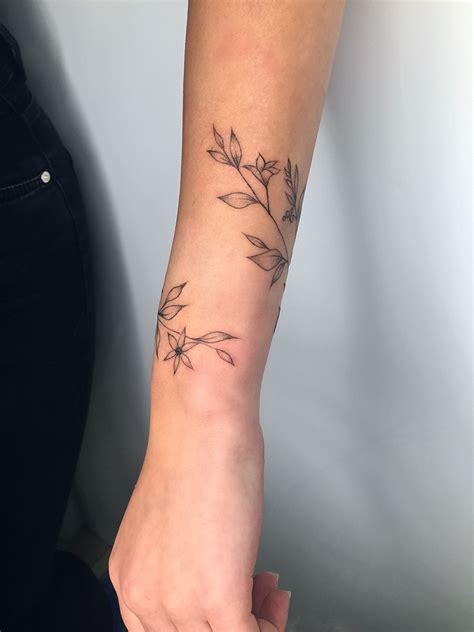 Pin By Anastasia On Tattoo Wrap Around Wrist Tattoos Flower Wrist