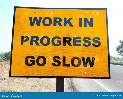 Go Slow Work In Progress Sign Board Beside Roads Stock Photo Image Of
