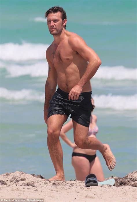 Alex Pettyfer Showcases His Toned Abs And Chiselled Chest As He Frolics