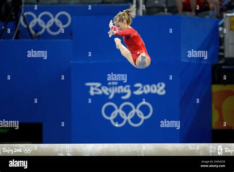 United States Gymnast Shawn Johnson Performs On The Balance Beam During