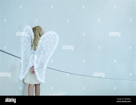 Girl Wearing Angel Wings Stock Photo Alamy