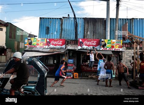 Youths Play Basketball In A Small Area In The Parola District Of Tondo Manila The Philippines