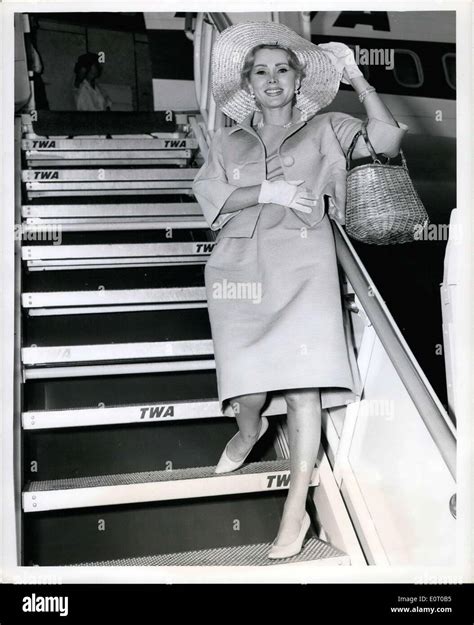 jun 01 1960 zsa zsa gabor adds a glamorous touch to the airport scene pior to boarding a twa