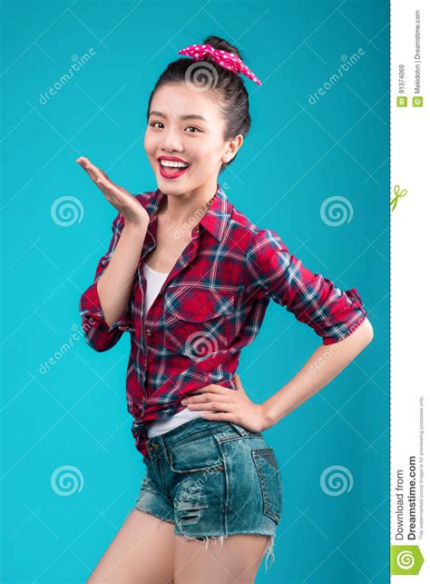 Smiling Lovely Asian Woman Dressed In Pin Up Style Dress Over Bl Stock Image Image Of