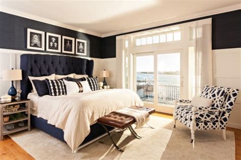 This living room plays on a coastal design and is perfect for curling up to read when it's too rainy for the beach. 17 Cozy Beach Style Bedrooms That Everyone Will Love
