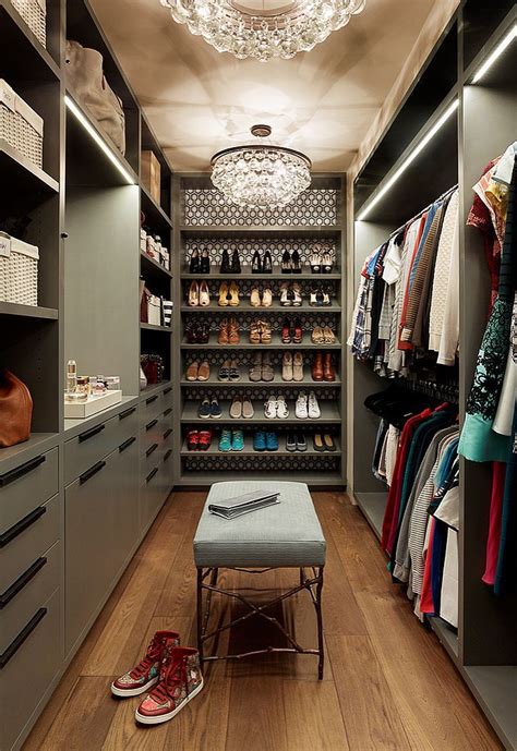 Gray Cabinets And Wardrobes Shape This Spacious Walk In Closet Of