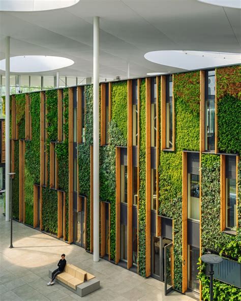 Office Building From Alliander Green Wall Design Green Facade Moss