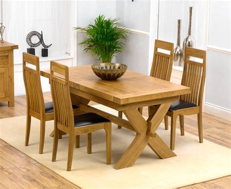 Column legs, beautiful beading and carvings all in the cafe noir finish. Mark Harris Avignon Oak Extending Dining Table and 4 Monte ...