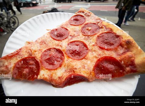 Large Single Slice Of Pepperoni Pizza New York City Usa Stock Photo Alamy