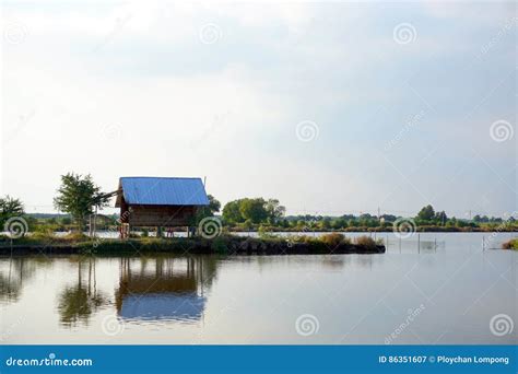 Landscape Lake with Cottage House Village. Relaxation Waterfront Hut