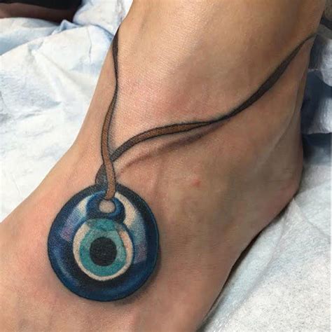 15 Tiny Evil Eye Tattoo Ideas To Ward Off Misfortune Evil Eye Tattoo