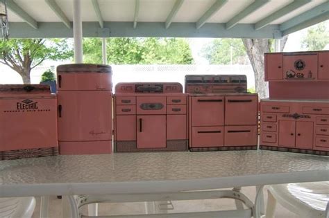 Then refinish it with the lacquer of your choice. Antique Childs Kitchen Set | Retro pink kitchens, Kids ...