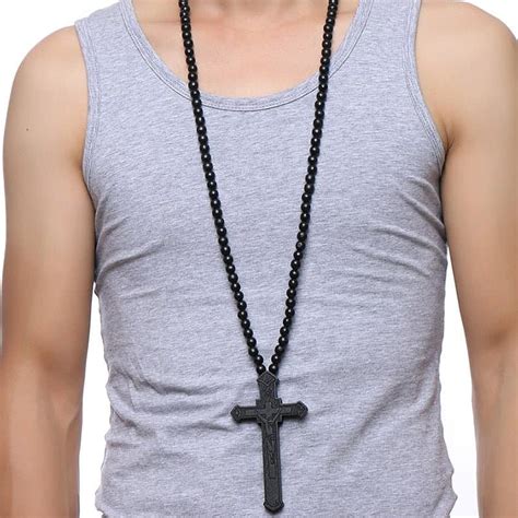 Cross is a geometric shape consisting of two intersecting lines or bars, usually perpendicular to each other. Large Wood Cross With Wooden Bead Carved Rosary Pendant ...