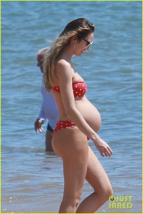 Pregnant Candice Swanepoel Flaunts Baby Bump In A Bikini Photo
