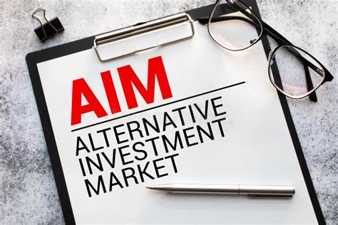 Text Aim Alternative Investment Market On White Paper Stock Photo