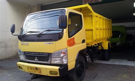 The pup is filled to capacity and taken to the construction site by a. Mitsubishi Colt diesel Dump truck 125 PS HD Tahun 2017 - MobilBekas.com