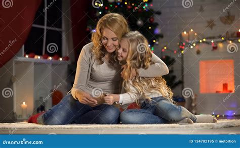 Excited Mom And Daughter Holding Letter For Santa Celebrating Xmas Together Stock Image Image