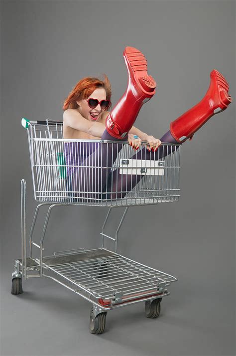 Red Girl Riding On A Shopping Cart Photograph By Nikita Buida Pixels