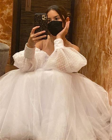 look kendra kramer wears a white tulle dress for her 13th birthday