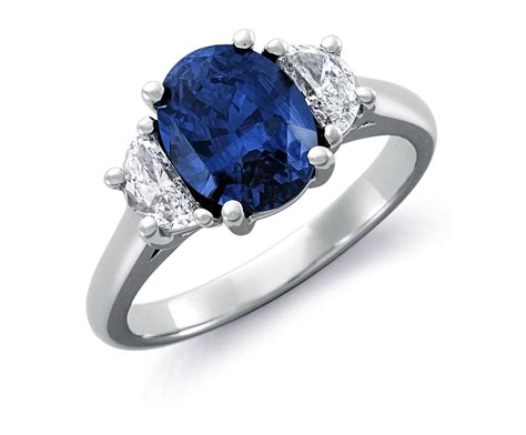Sapphire And Half Moon Shaped Diamond Ring In Platinum 9x7mm Blue