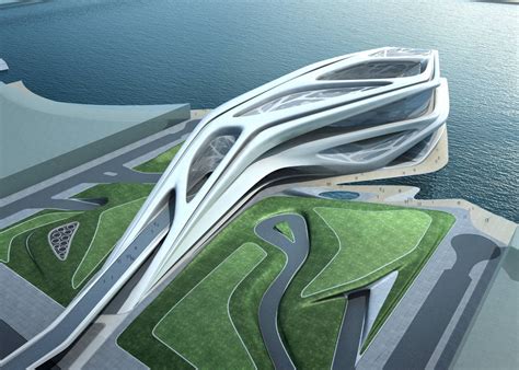An Aerial View Of A Futuristic Building On The Water