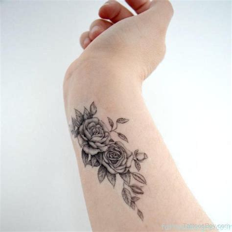 Grey Flower Tattoo Design On Wrist Rose Tattoos On Wrist Vine Tattoos