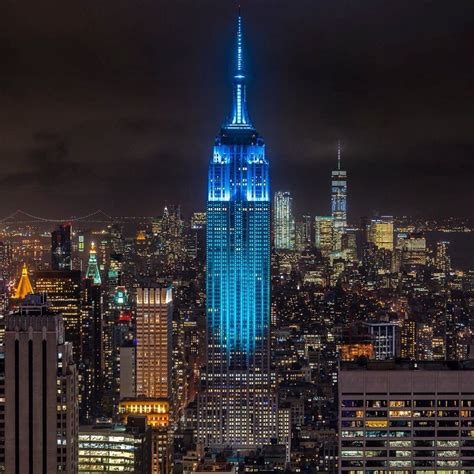 The Empire State Building Lighting Up The Manhattan Sky By Noel Yc