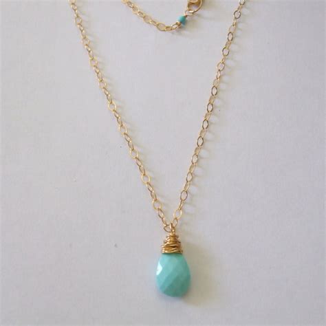 Faceted Sleeping Beauty Turquoise Pendant Wire Wrapped Gold